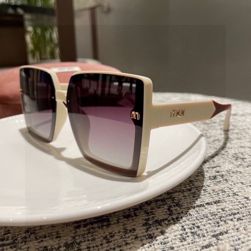 Miu miu Sunglasses